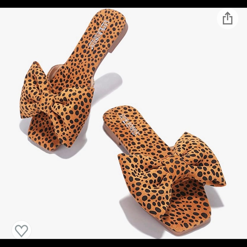Leopard print slip on sandals with large bow